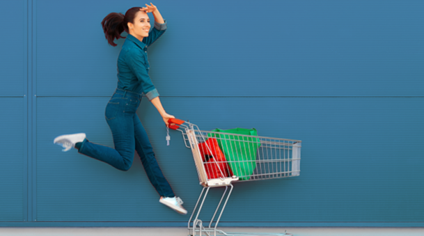 Excited supermarket customer on sale season